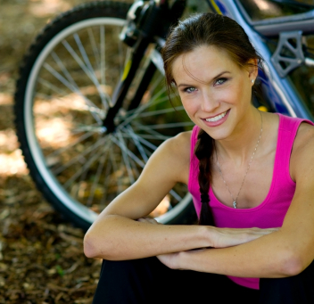 women athlete on bike